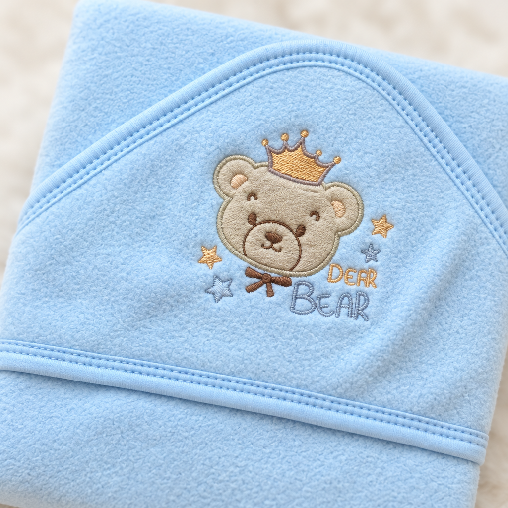 Blue bear and crown blanket detail