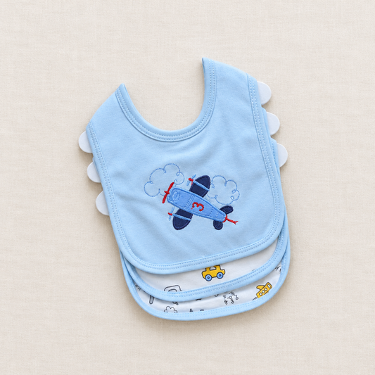 Blue pack of three bibs flat lay
