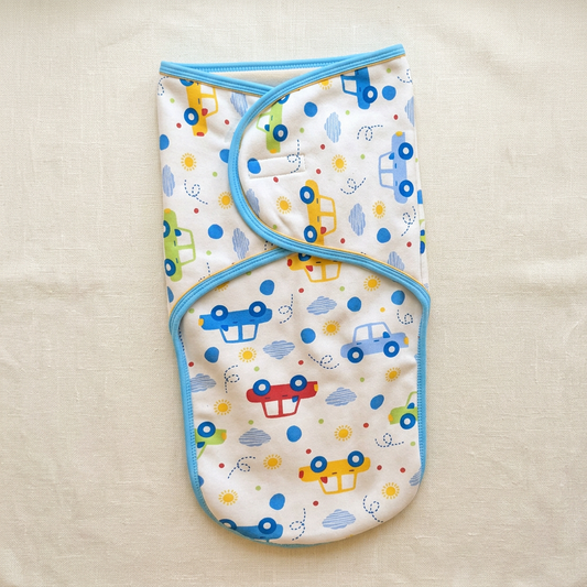 Car-print winter swaddle flat lay