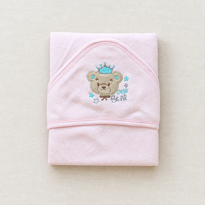 Pink bear and crown blanket flat lay