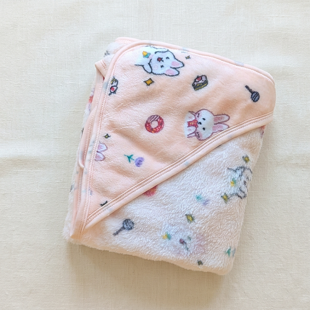 Pink kitty hooded blanket flat lay